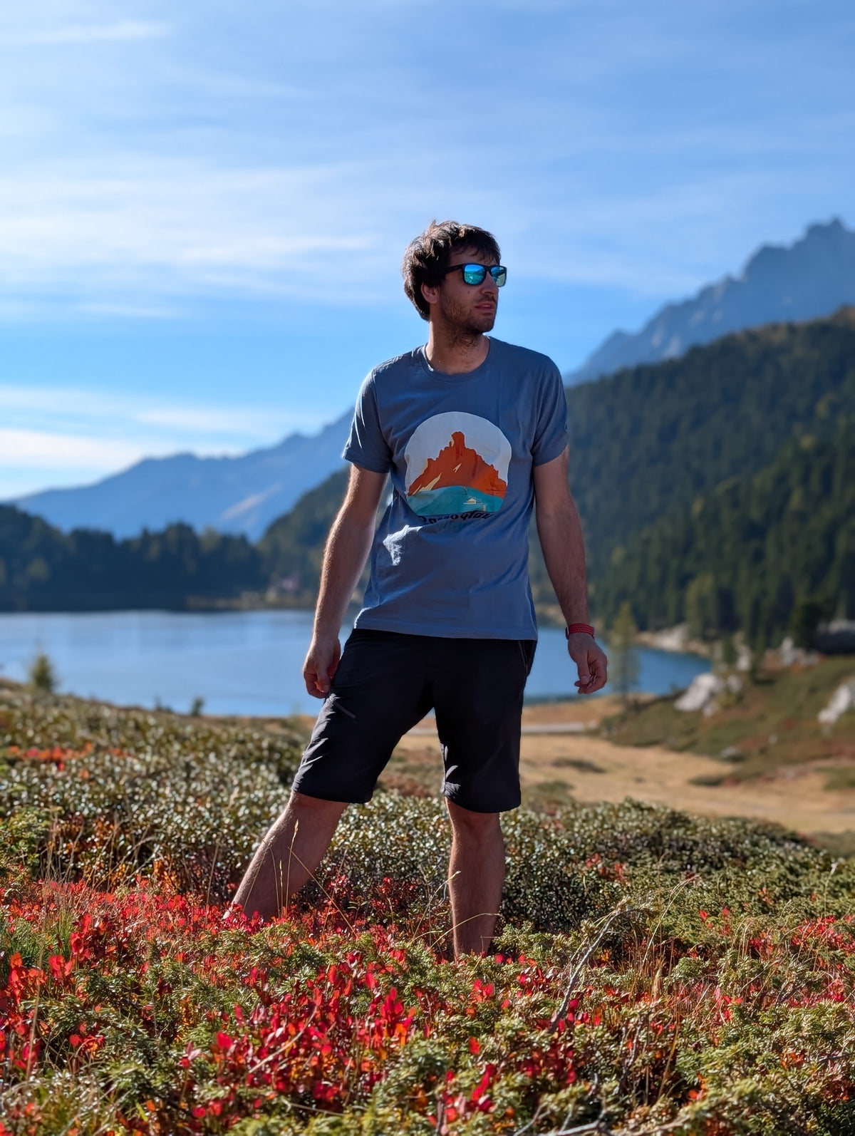 Passo Giau men's t-shirt with front print, worn on an autumn hike by an alpine lake