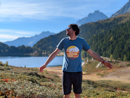 Half Dome men's t-shirt with front print, worn on an autumn hike by an alpine lake
