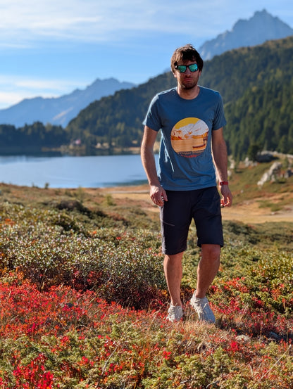 Half Dome men's t-shirt with front print, worn on an autumn hike by an alpine lake